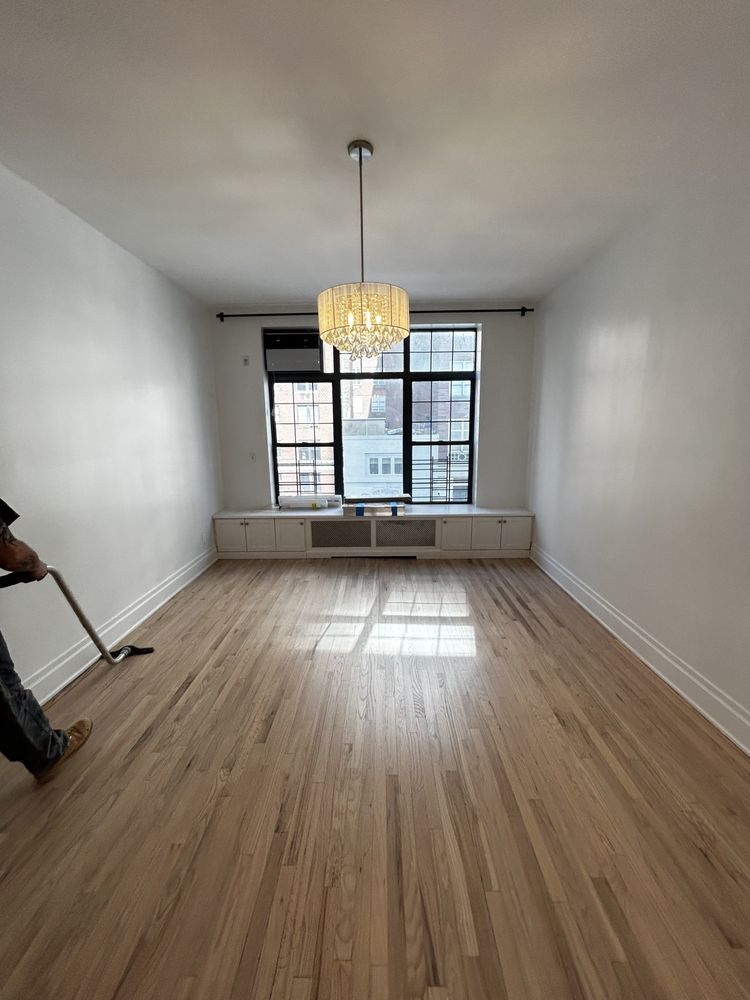 Wide plank white oak hardwood flooring in elegant living room